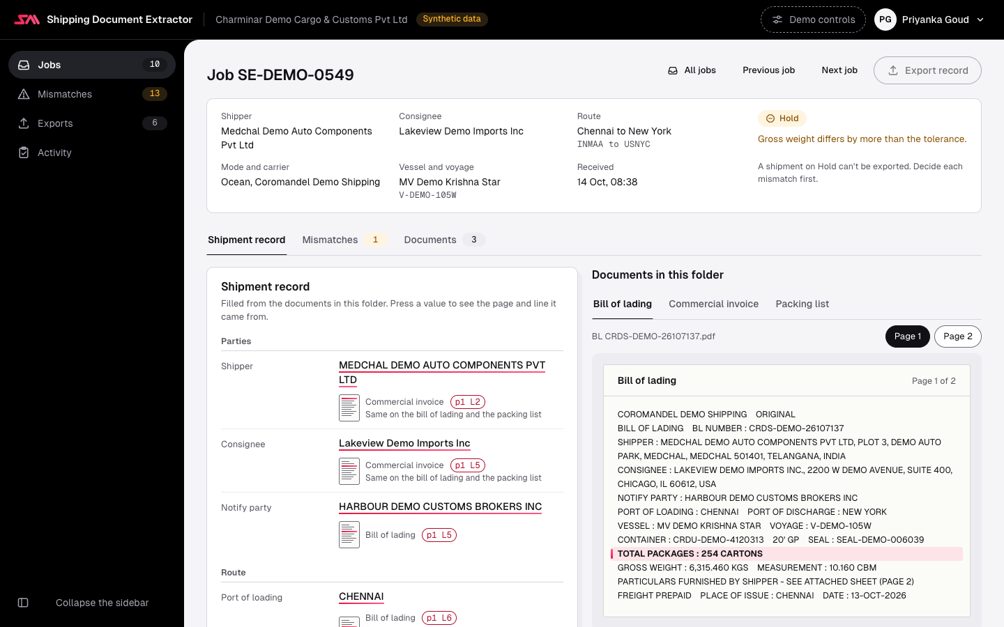 Job SE-DEMO-0549, Chennai to New York: the job header with shipper, consignee, route, carrier, vessel and the Hold lane with its reason. Below, the shipment record as a form beside the documents in the folder. Each field shows its document and page with a small page thumbnail; the Packages value has been pressed, and on the bill of lading the line TOTAL PACKAGES : 254 CARTONS is lit.